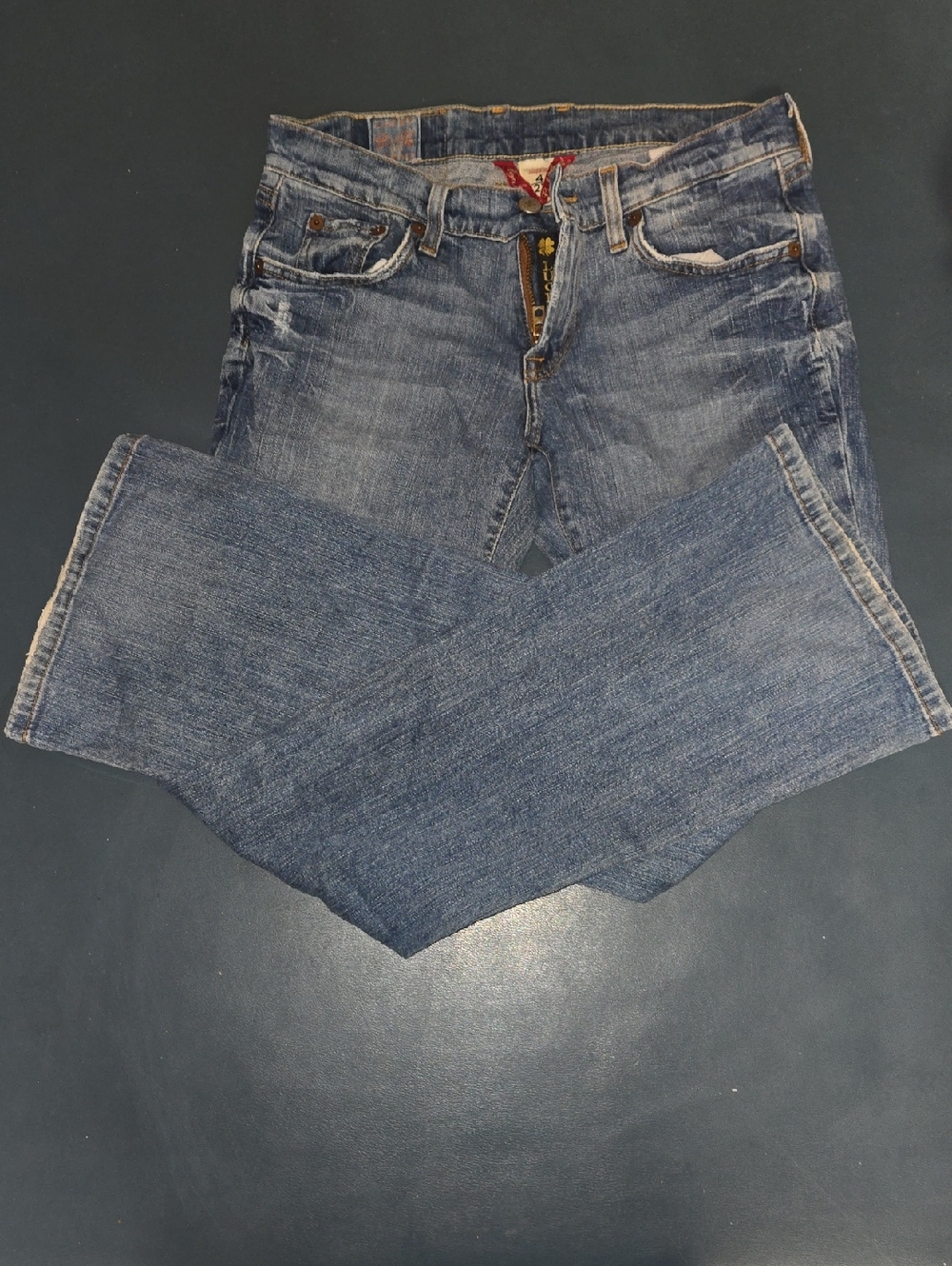 Lucky Brand light blue denim jeans with gold trim